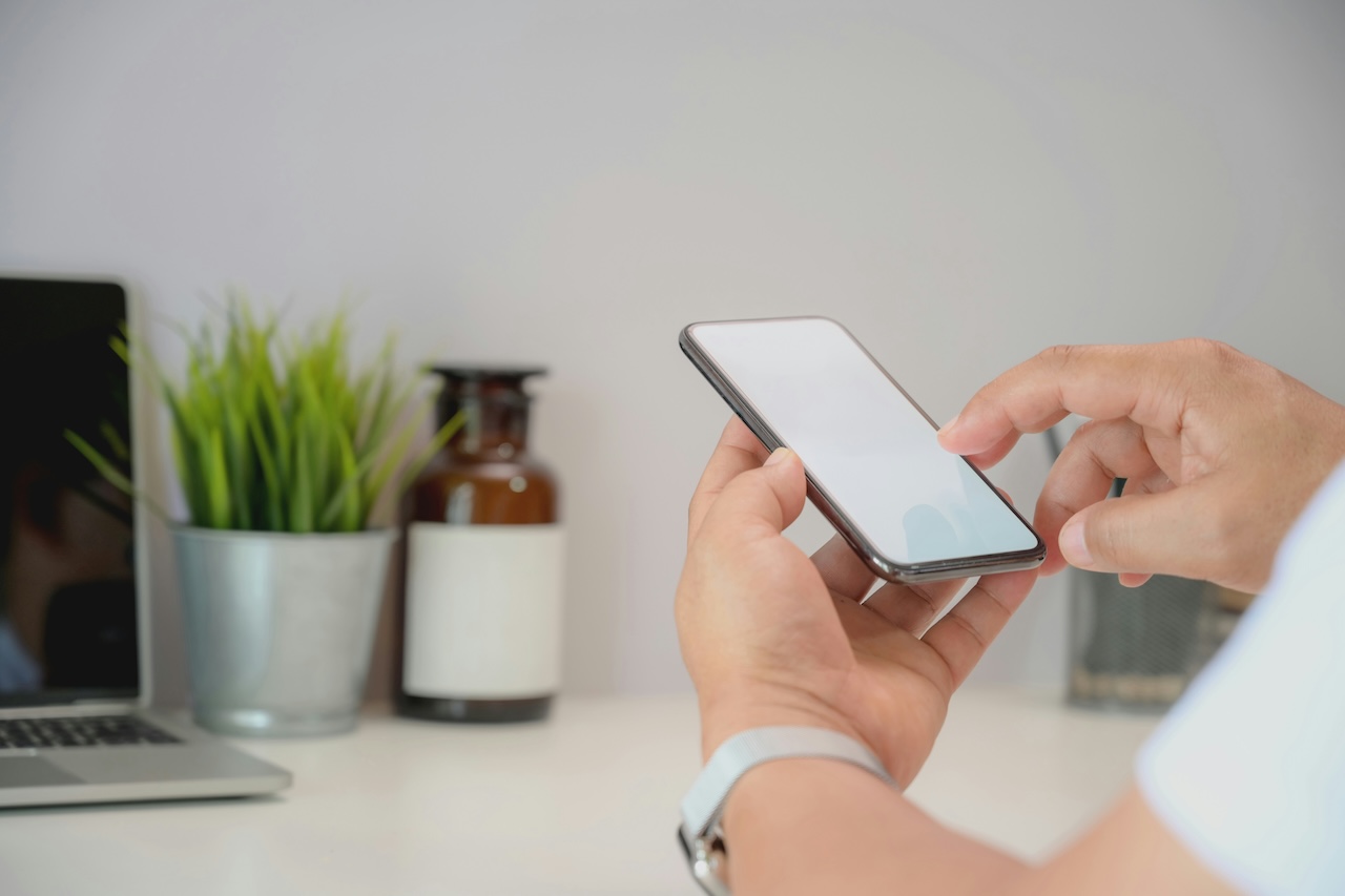 A patient messaging their physician from a phone