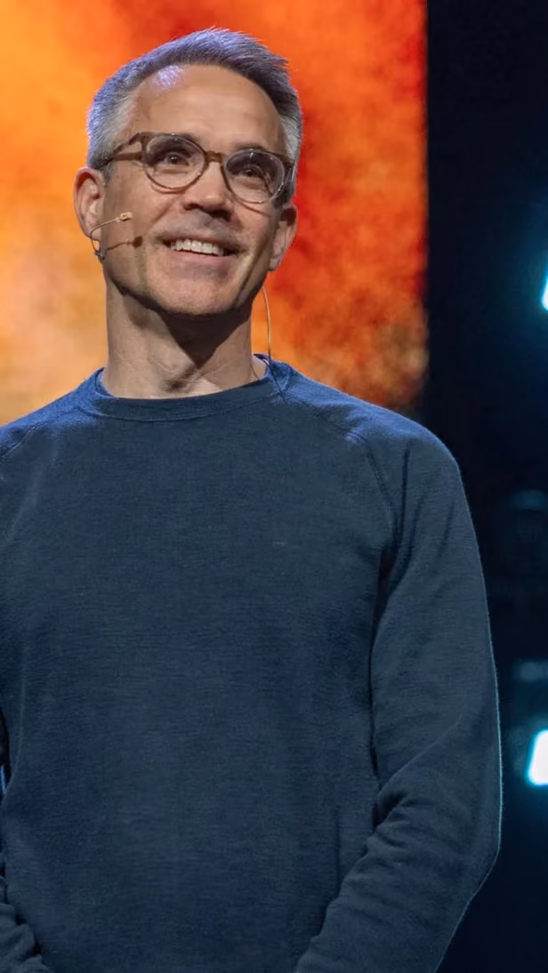 Speaker in glasses smiling on stage during the Northshore Church sermon clip When Your Plan Falls Apart.