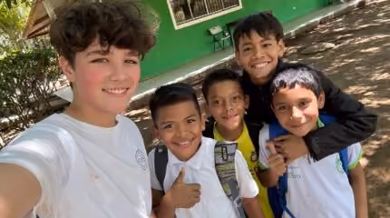 Young boys smiling together, supported by Northshore's UNIDOS partnership in Nicaragua.