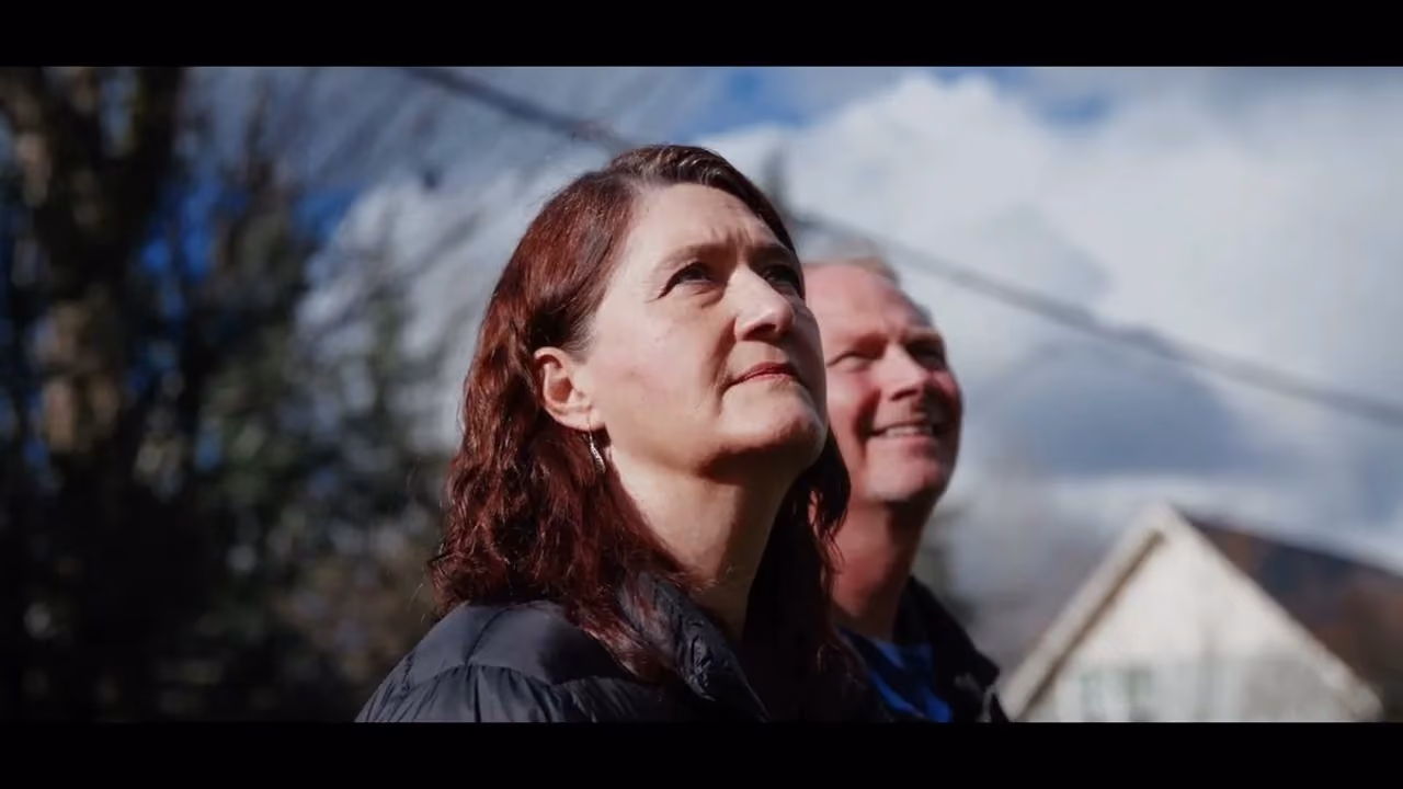 Ryan and Kendal looking up together, sharing their story of hope after divorce.