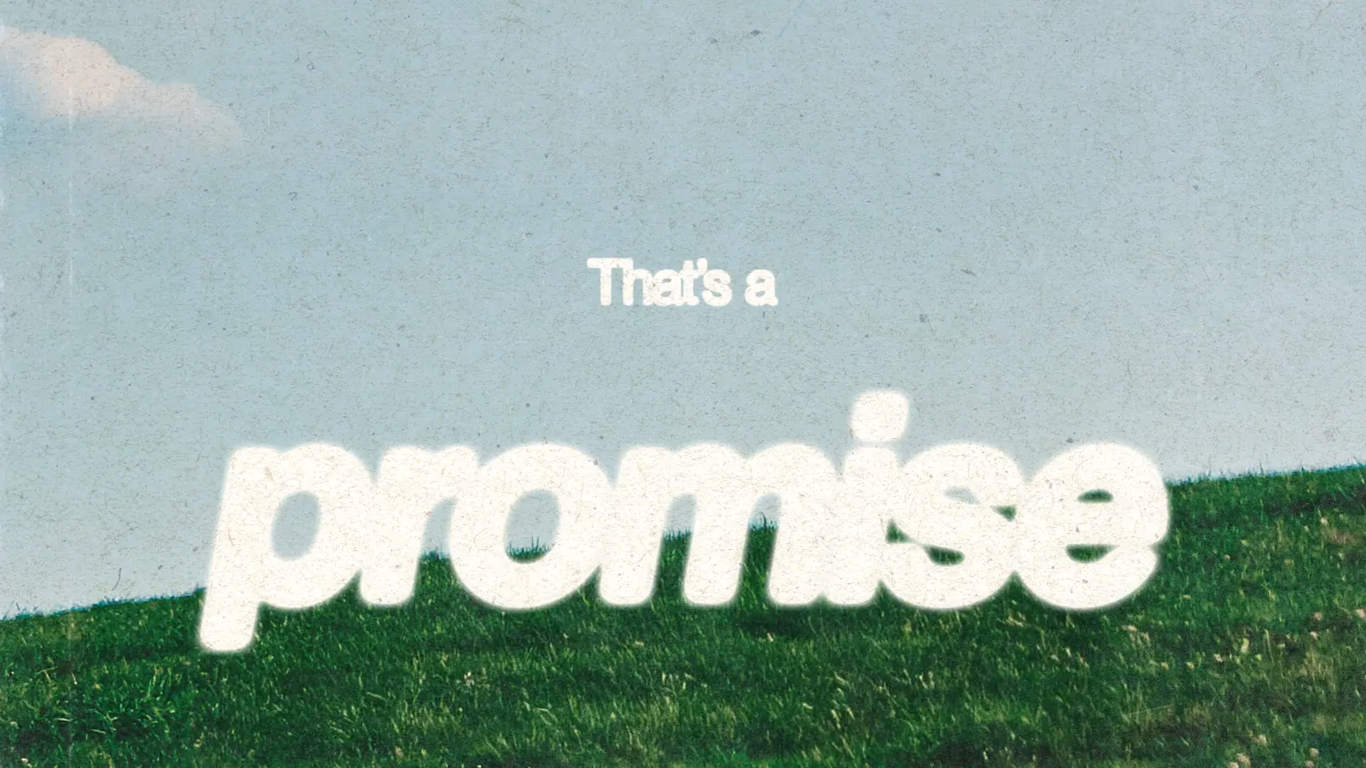 White text on grass and sky background with words That's a promise.