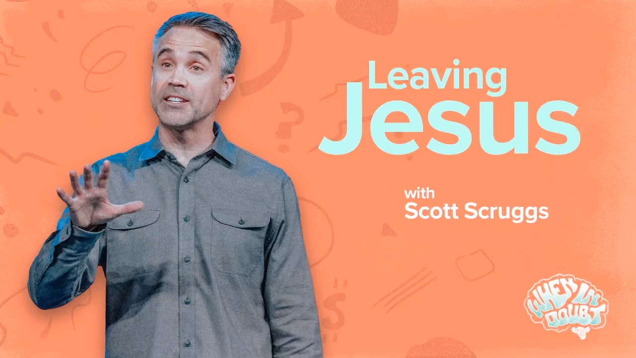 Leaving Jesus with Scott Scruggs, one hand raised while speaking in a denim shirt.