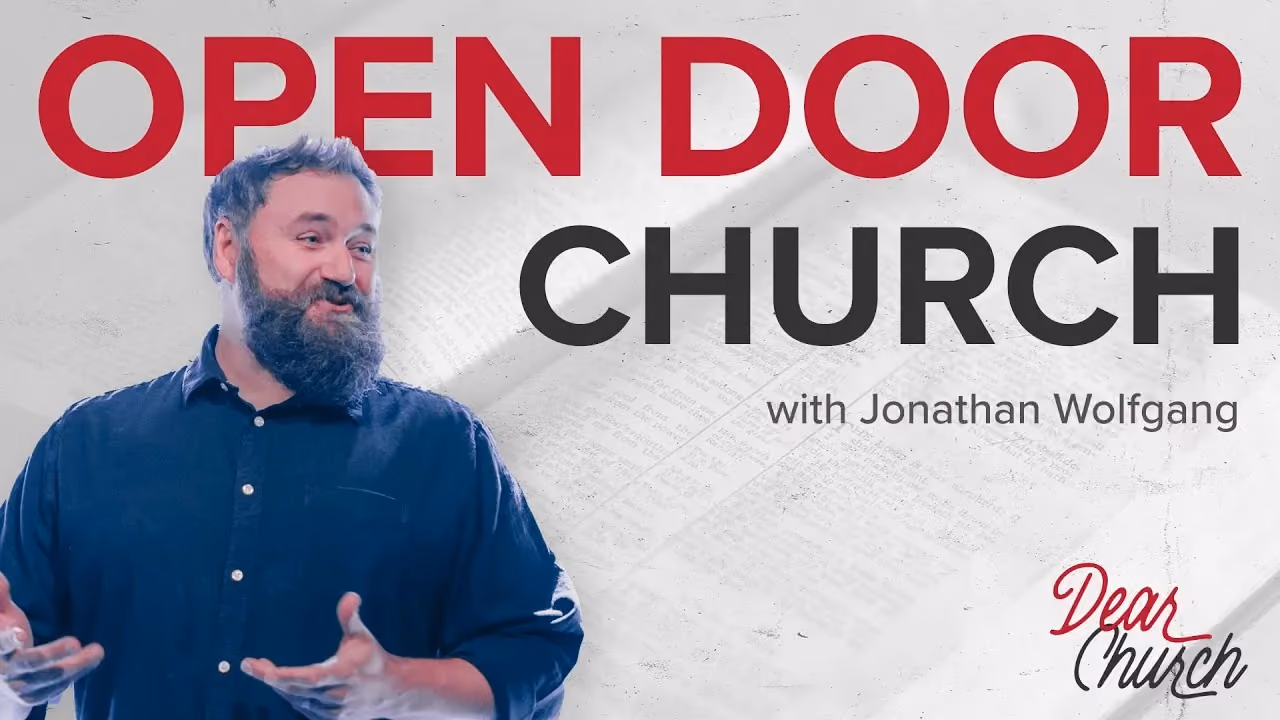 Open Door Church with Jonathan Wolfgang, both hands gesturing over an open Bible backdrop.
