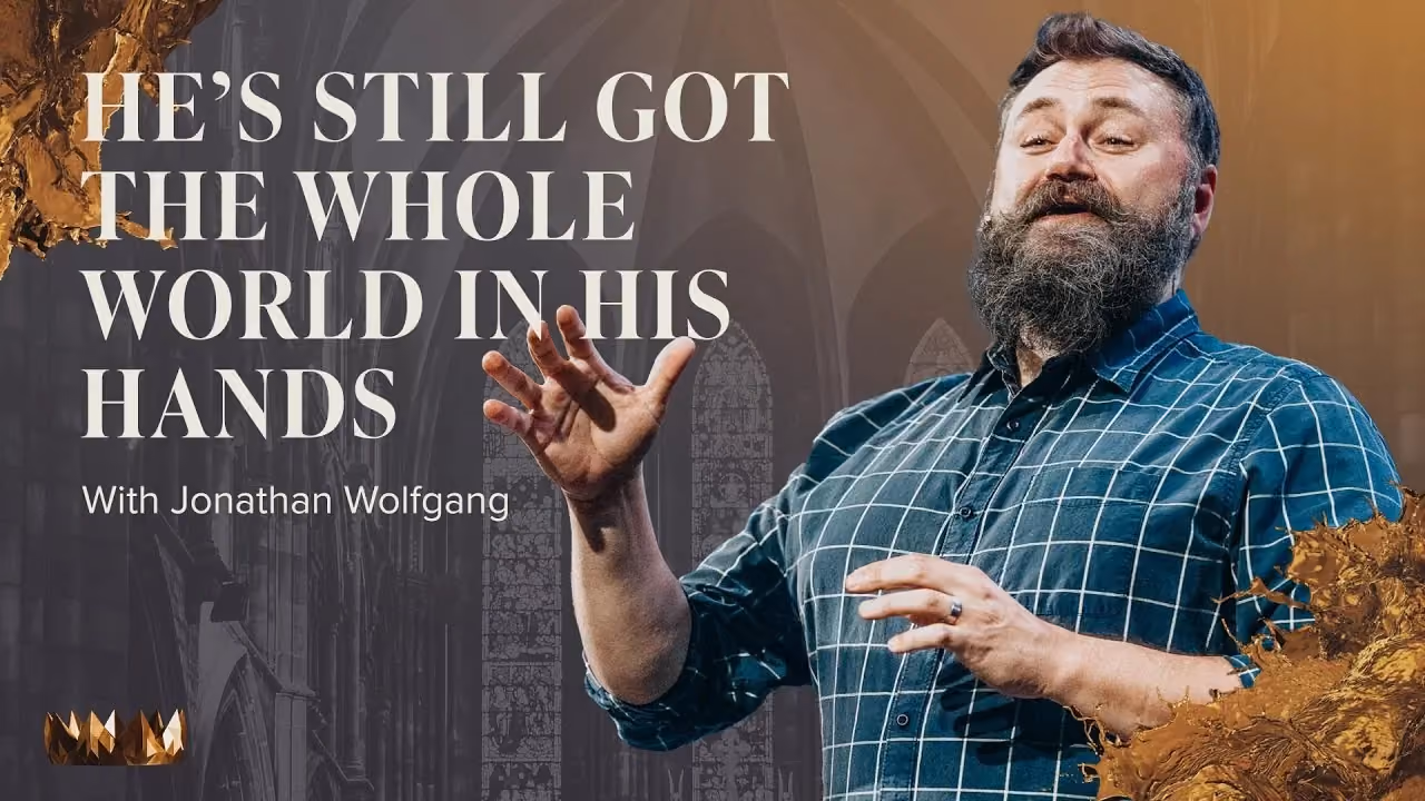 He's Still Got the Whole World In His Hands with Jonathan Wolfgang, hands open in teal plaid.