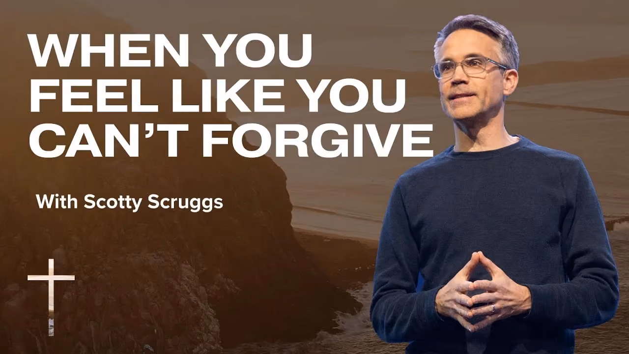 When You Feel Like You Can't Forgive with Scotty Scruggs, hands together in a navy sweater.