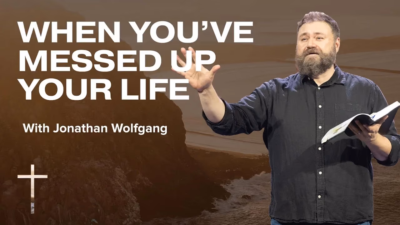 When You've Messed Up Your Life with Jonathan Wolfgang, holding an open Bible as he speaks.