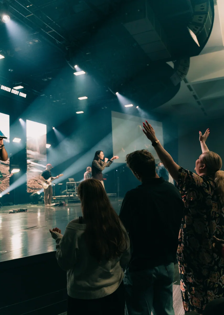 People worshiping together during a service at Northshore Church.