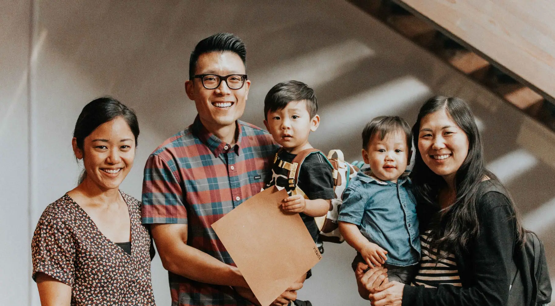 A happy family with two children visiting Northshore Church.