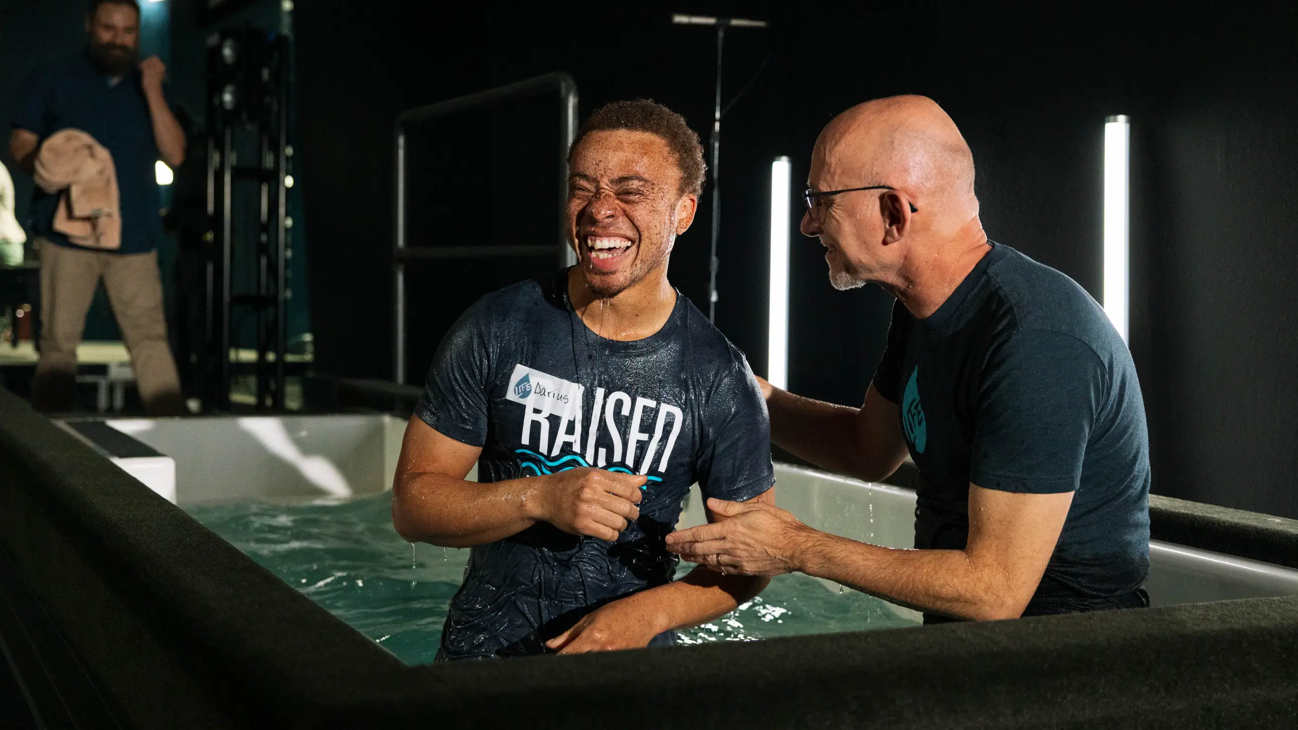 A man celebrating during his water baptism at Northshore Church.