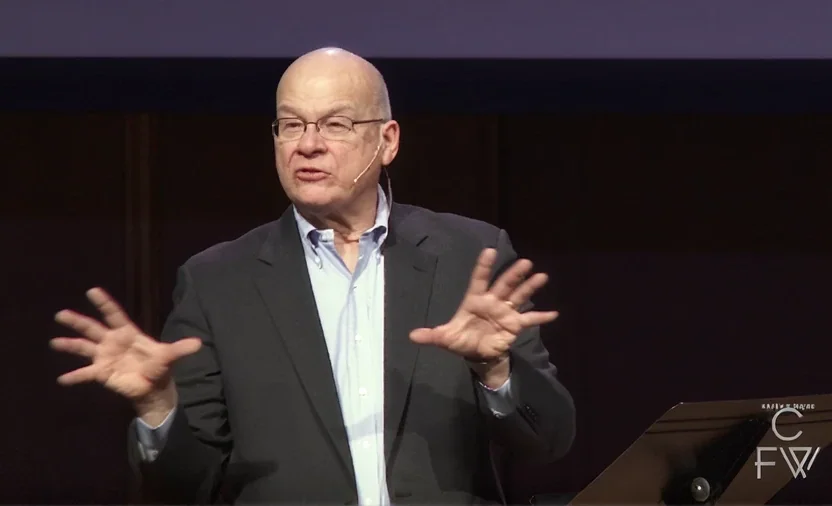 A man speaking at a racial reconciliation conference.