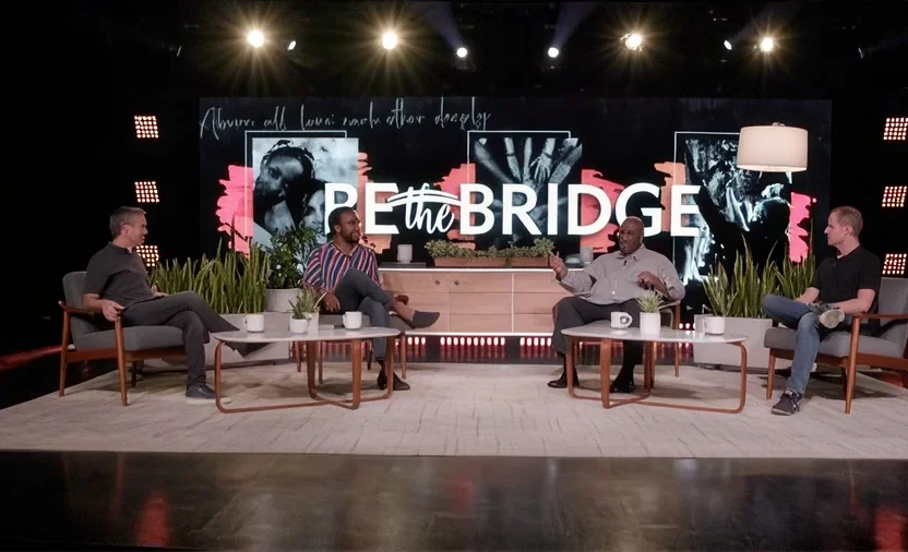Promotional graphic for The Bridge talk show on racial reconciliation.