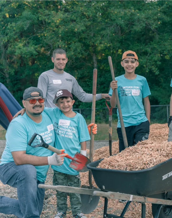 A family volunteering together.