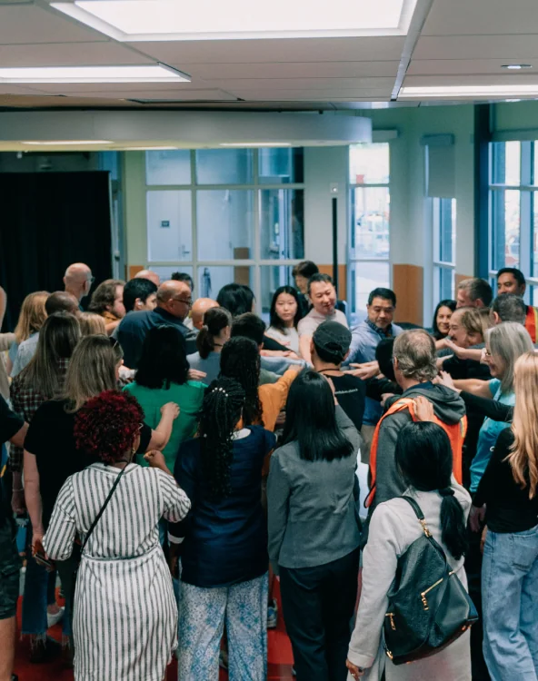 A group gathered in a conference room.