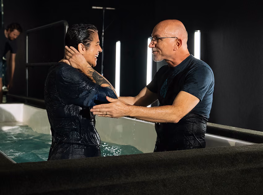 women smiling after getting baptized