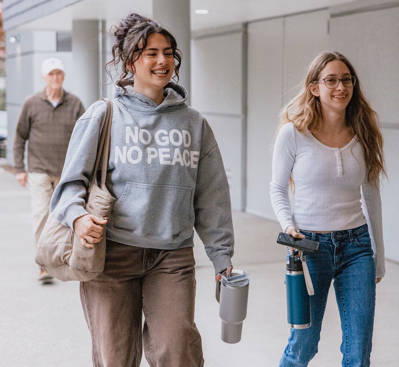 women walking smiling