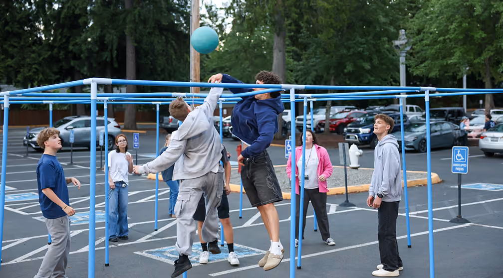 group of students playing a game outside.
