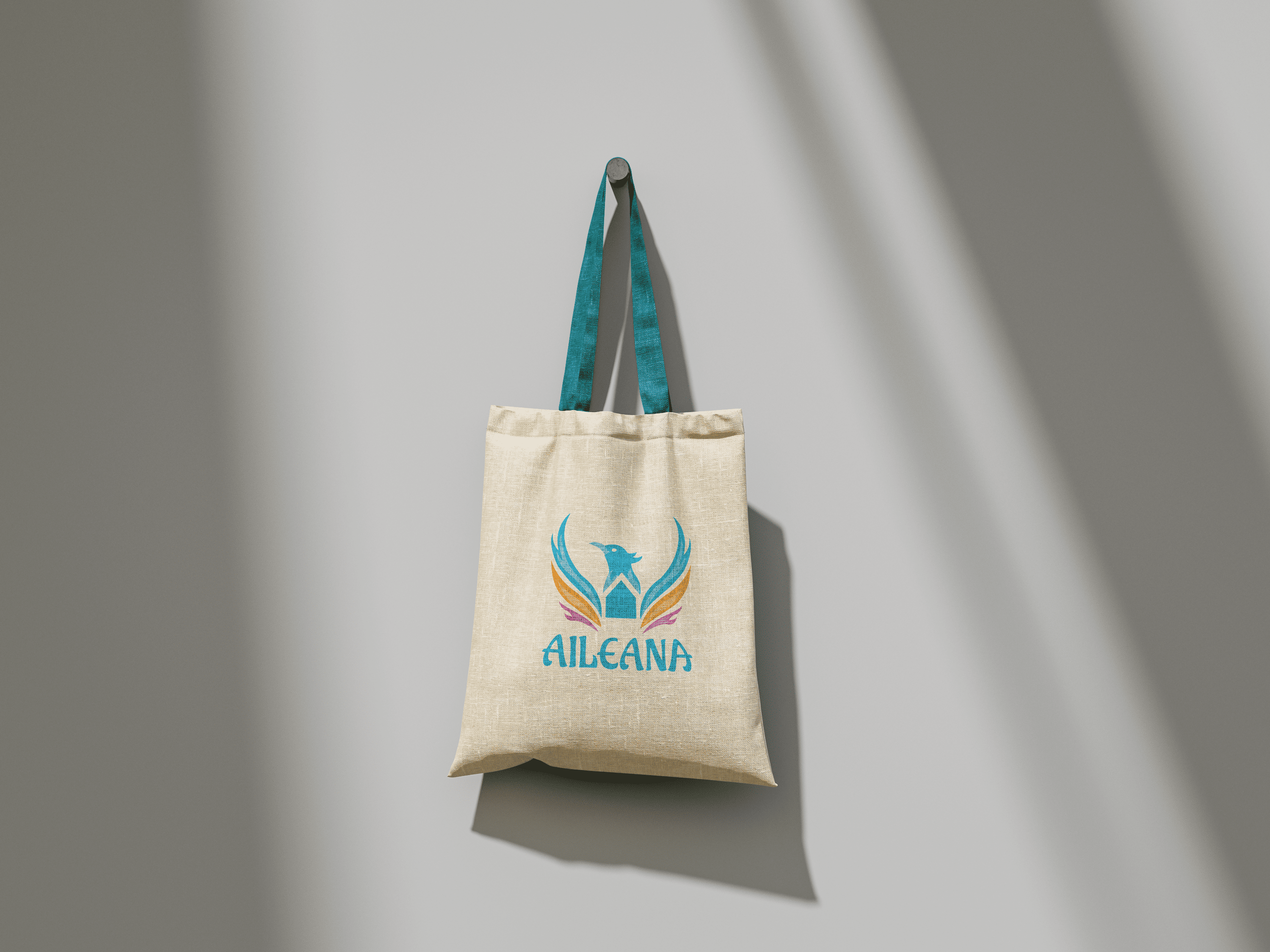 Mockup de mise en avant de l'identité visuelle sur un tote bag, de l'association aileana client de lia studio