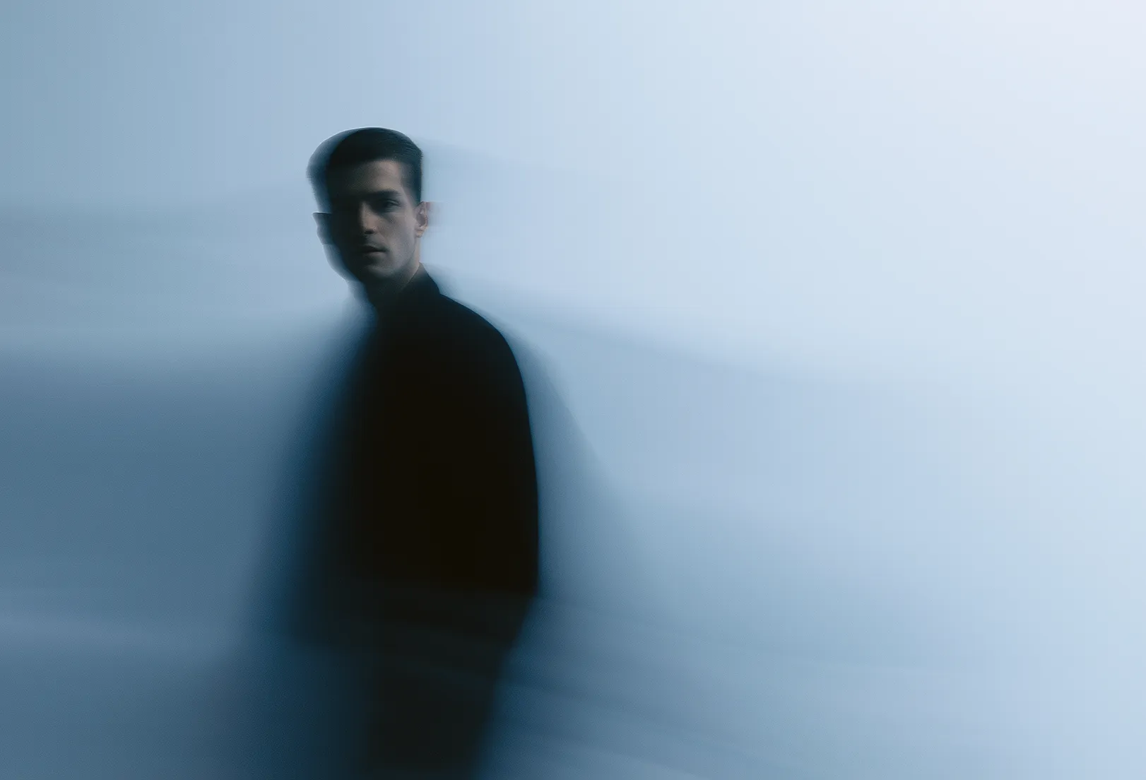 Blurred artistic portrait of a person in motion
