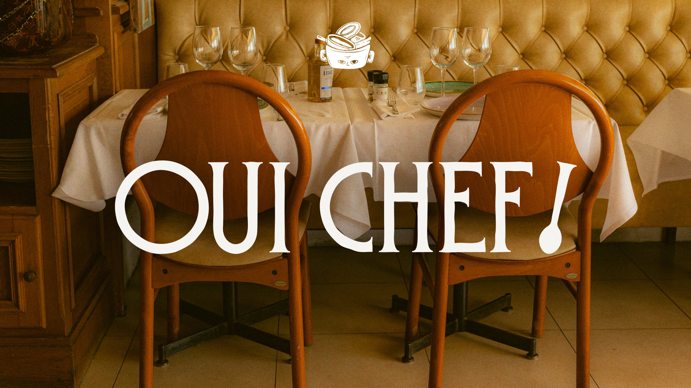 Oui Chef! : lettrage peint sur une photo de salle de restaurant