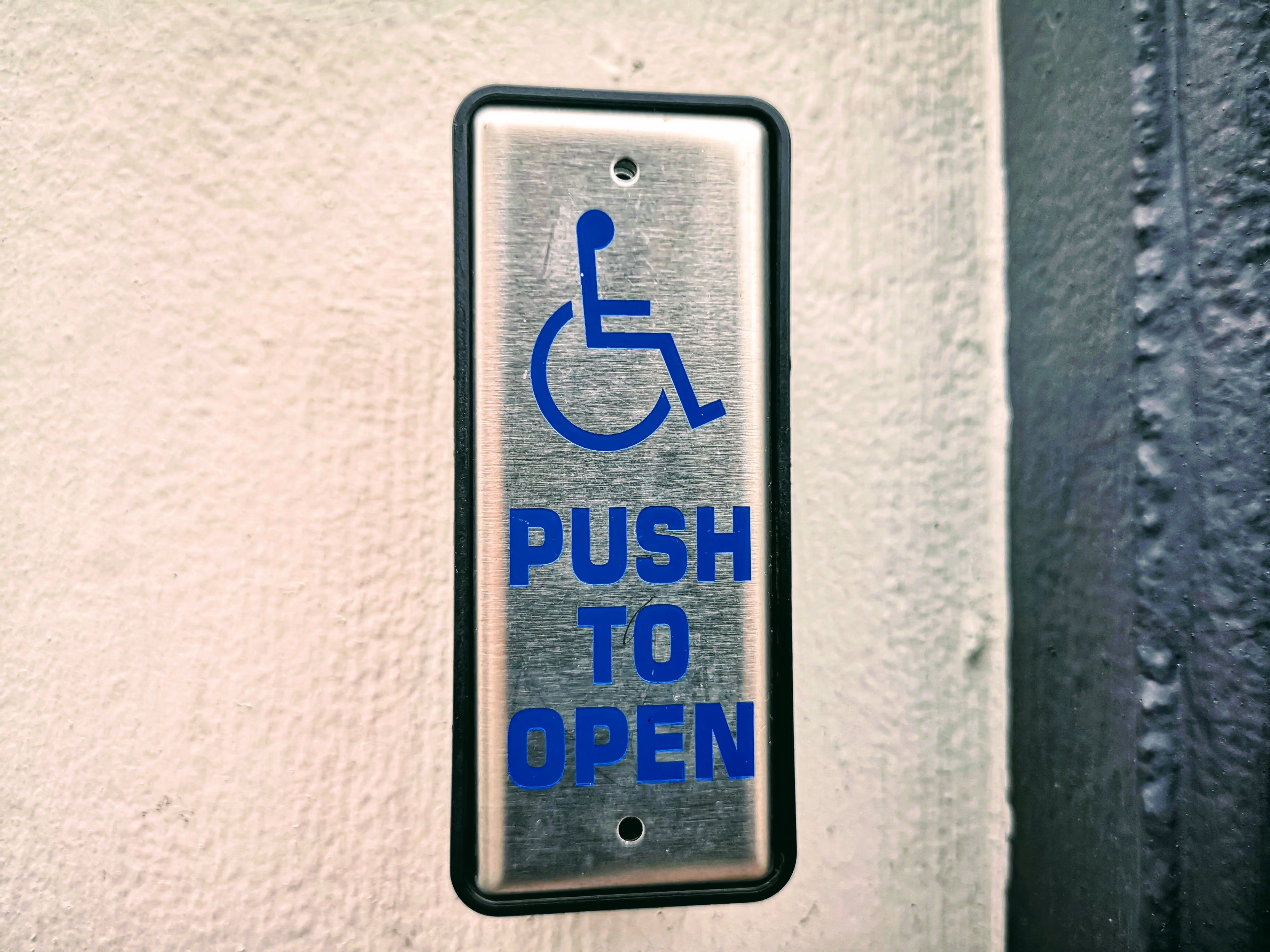Drukknop voor het openen van een automatische deur