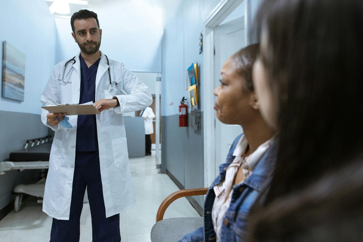 Doctor speaking with colleagues