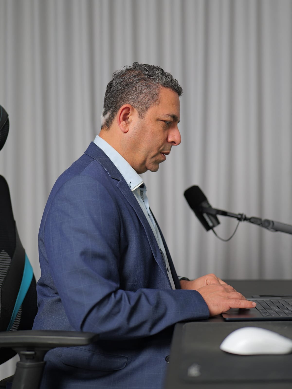 Dr Nader Malik at his computer