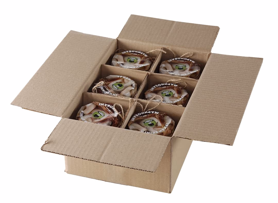 Open cardboard box containing six jars with mushroom labels and tied with string.