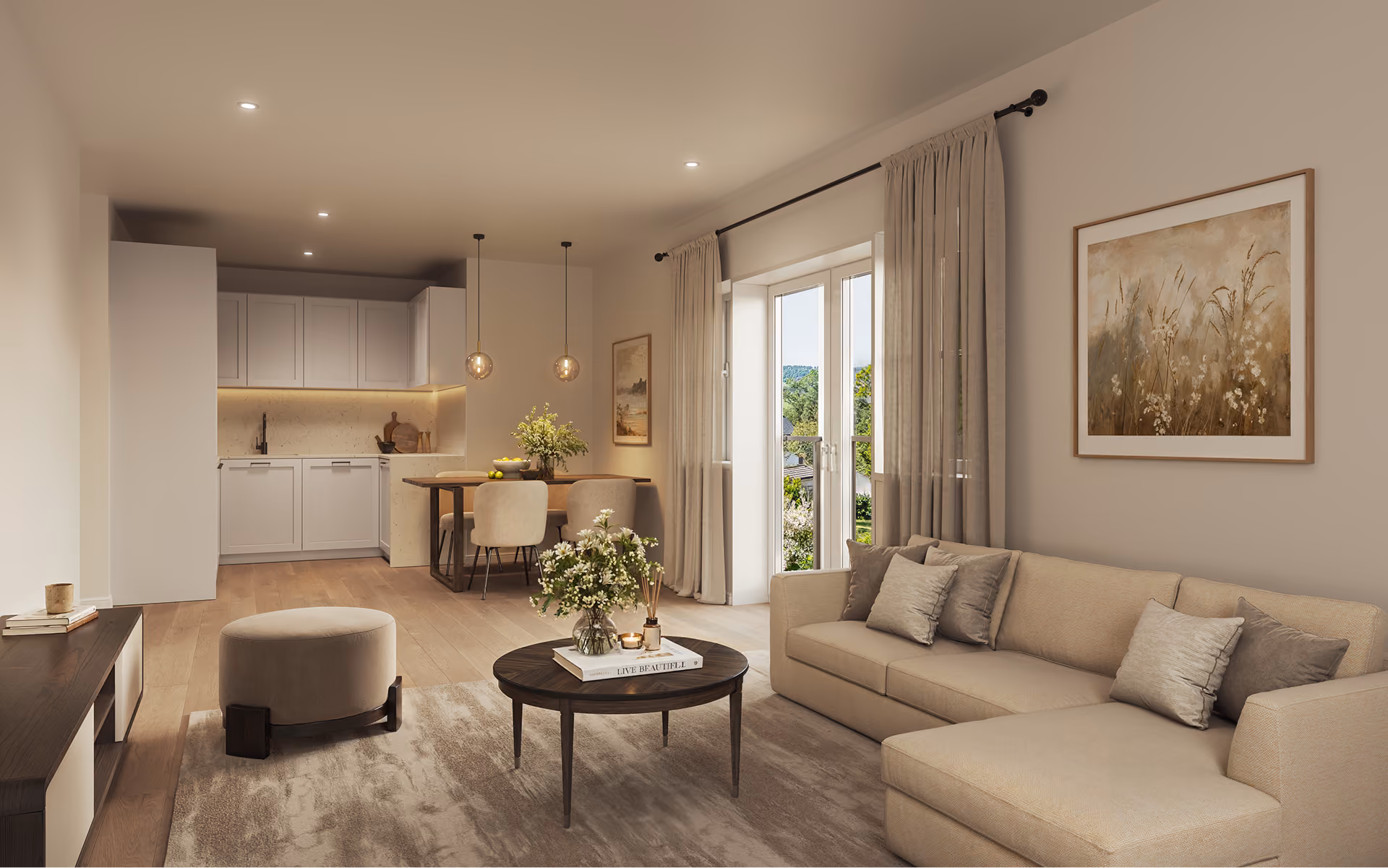 Modern living room with beige sofa, round coffee table, neutral rug, and open kitchen and dining area.