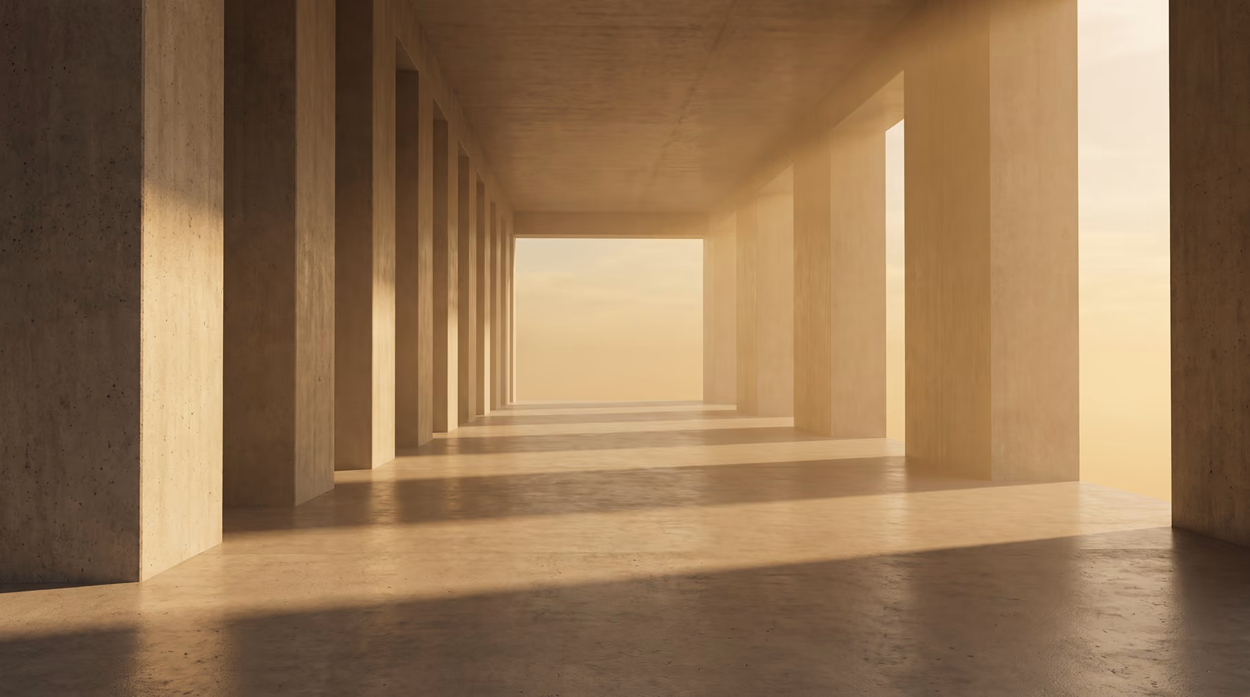 Concrete corridor with columns and shadows