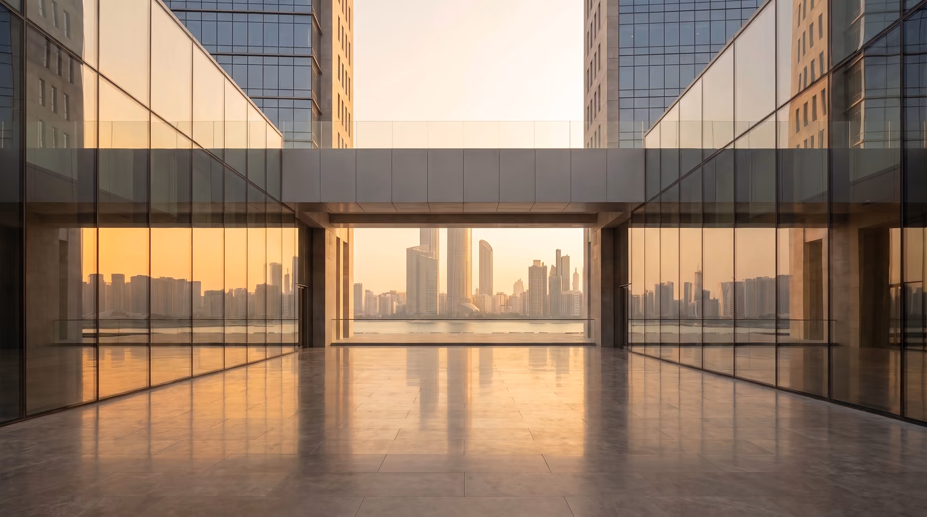 Glass sky bridge connecting two buildings