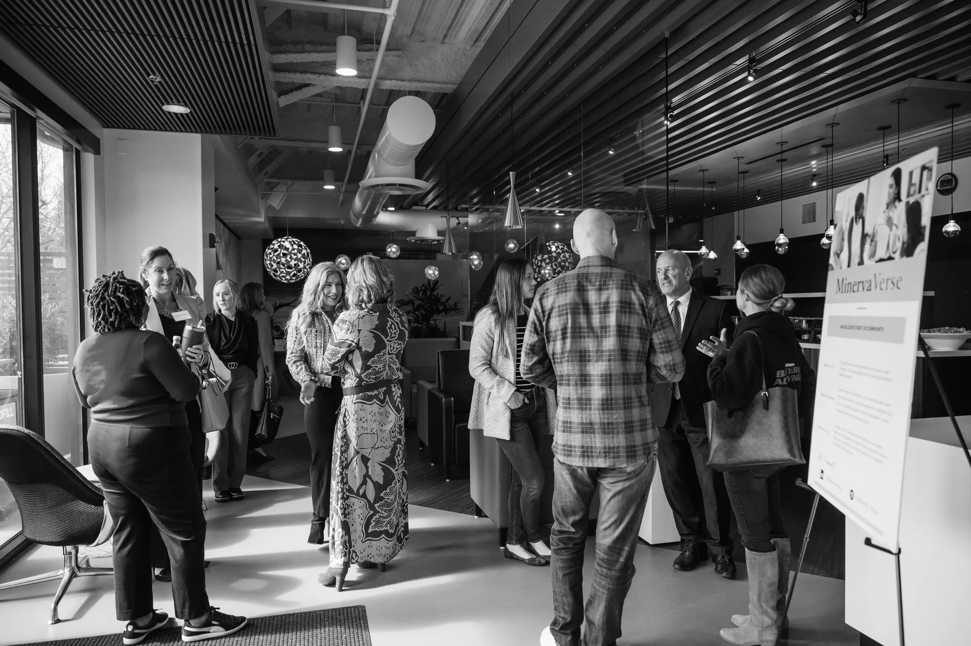 Guests mingling at a MinervaVerse community event