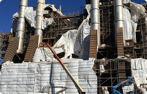 Commercial building wrapped in containment