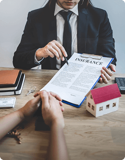 Insurance adjuster reviewing claim documents