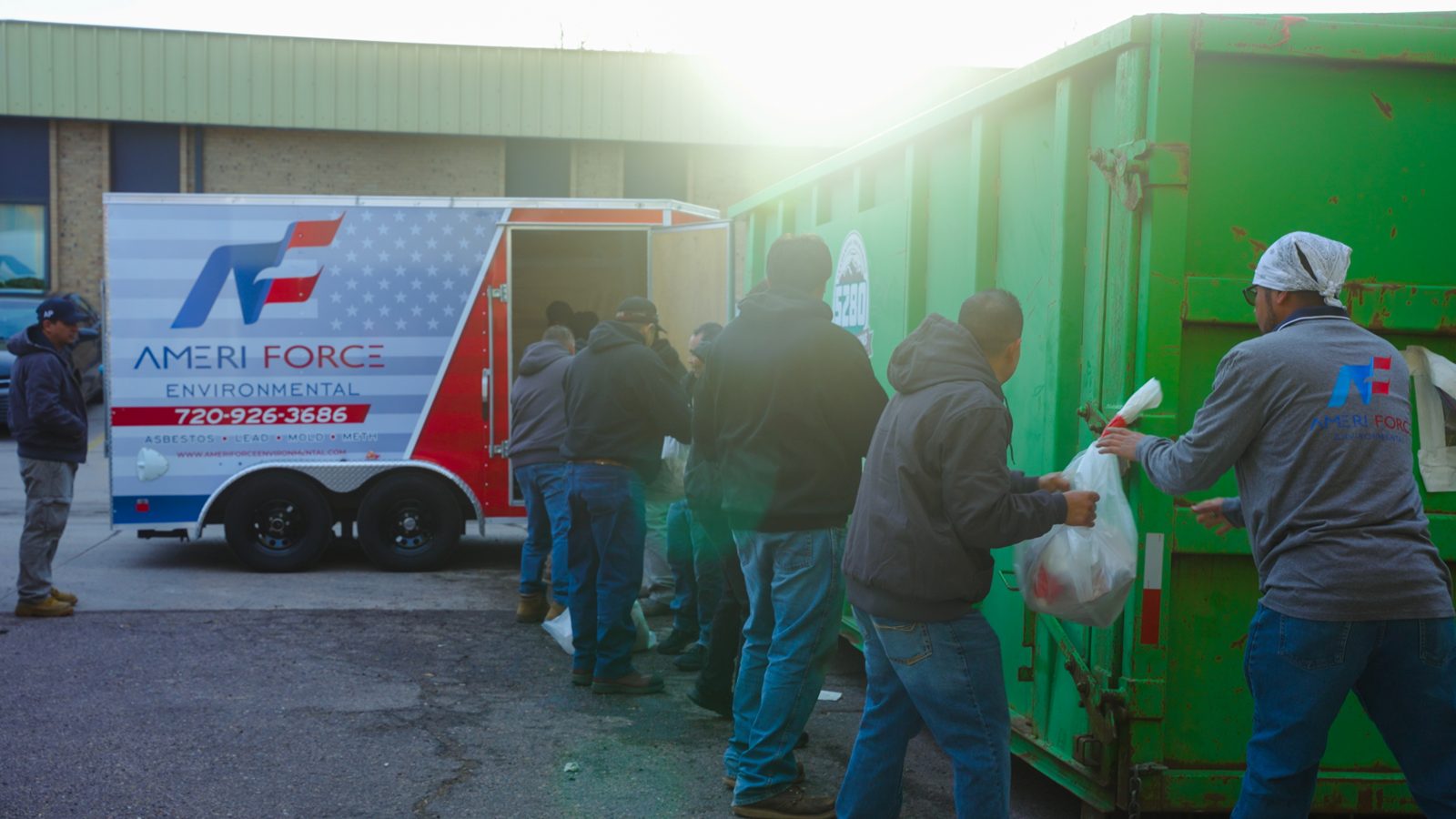 Crew at the AmeriForce trailer and roll-off dumpster