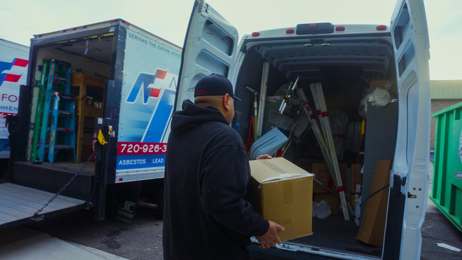 Technician loading a branded AmeriForce van