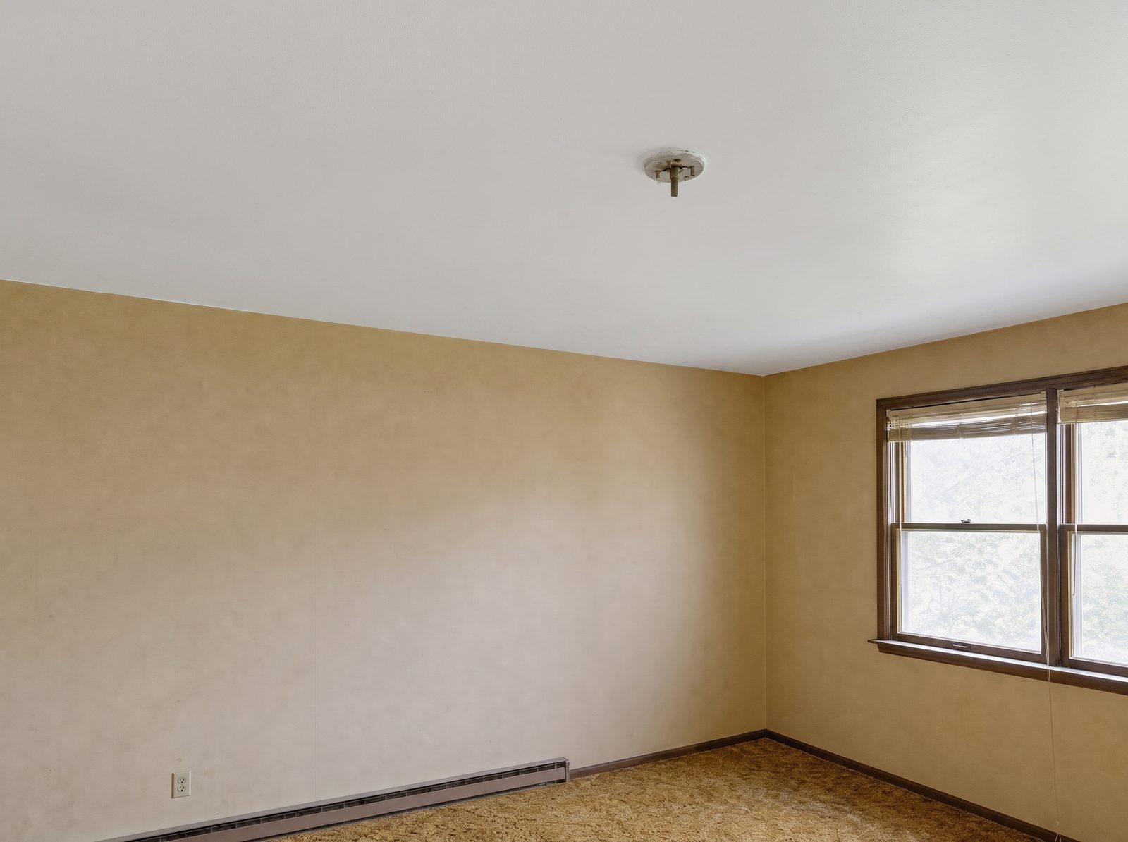 Illustrative after: smooth repainted ceiling