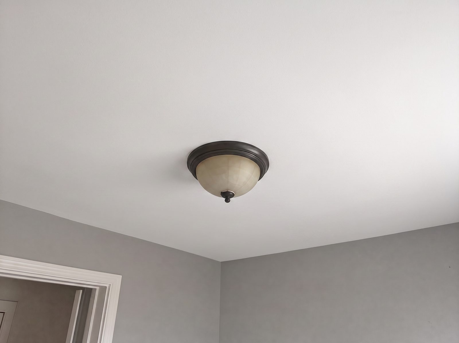 Illustrative after: ceiling repaired and repainted