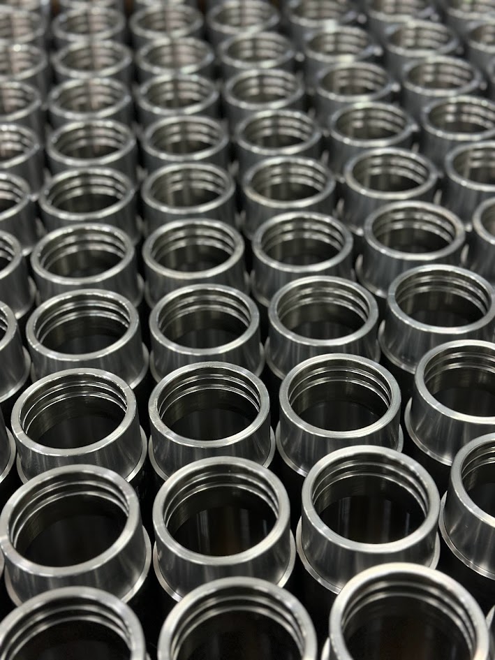 Machined bushings in stock on the shelf