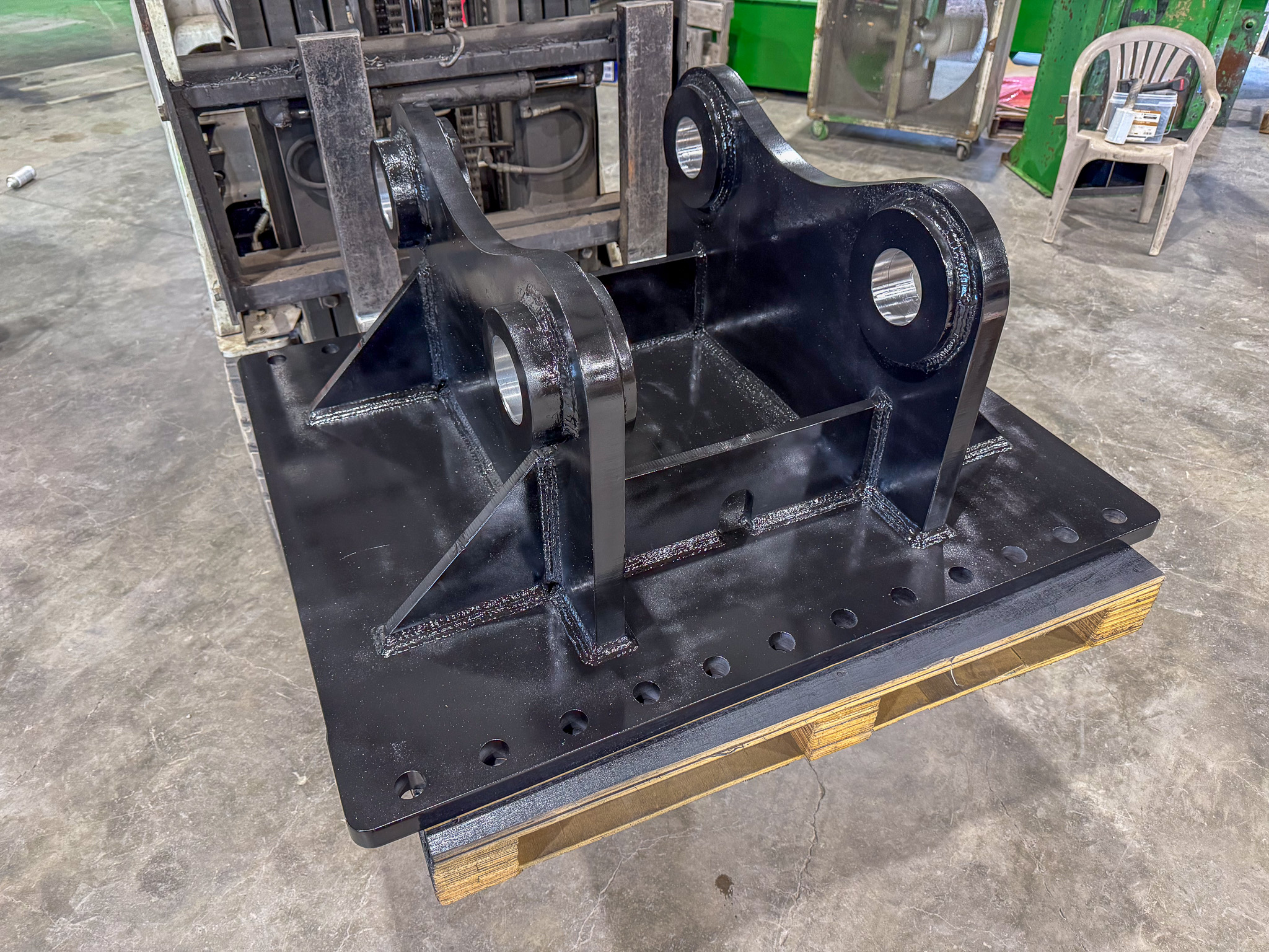 Custom built excavator crusher bucket attachment plate