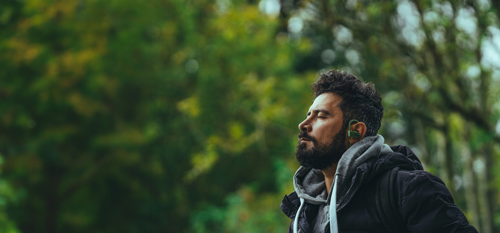 Man with ear buds in