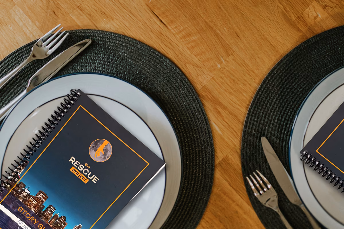 The Rescue Project Story Guide on a kitchen table