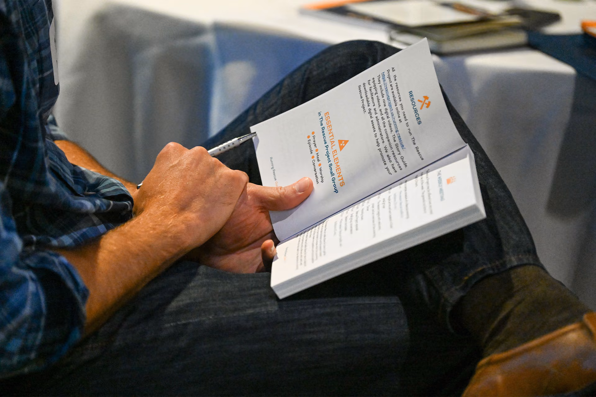 Man reading his Rescue workbook