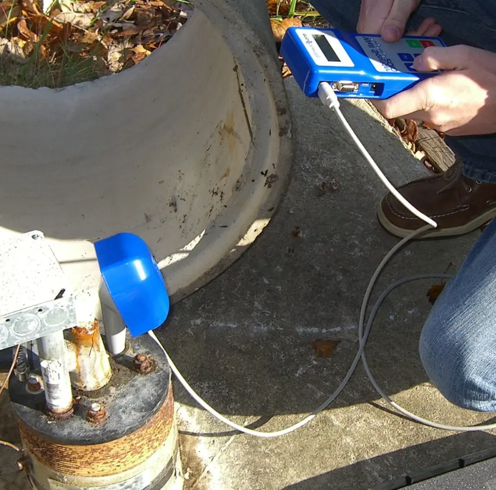 H2O Easy measuring the water level in a private well during a Well Performance Evaluation.