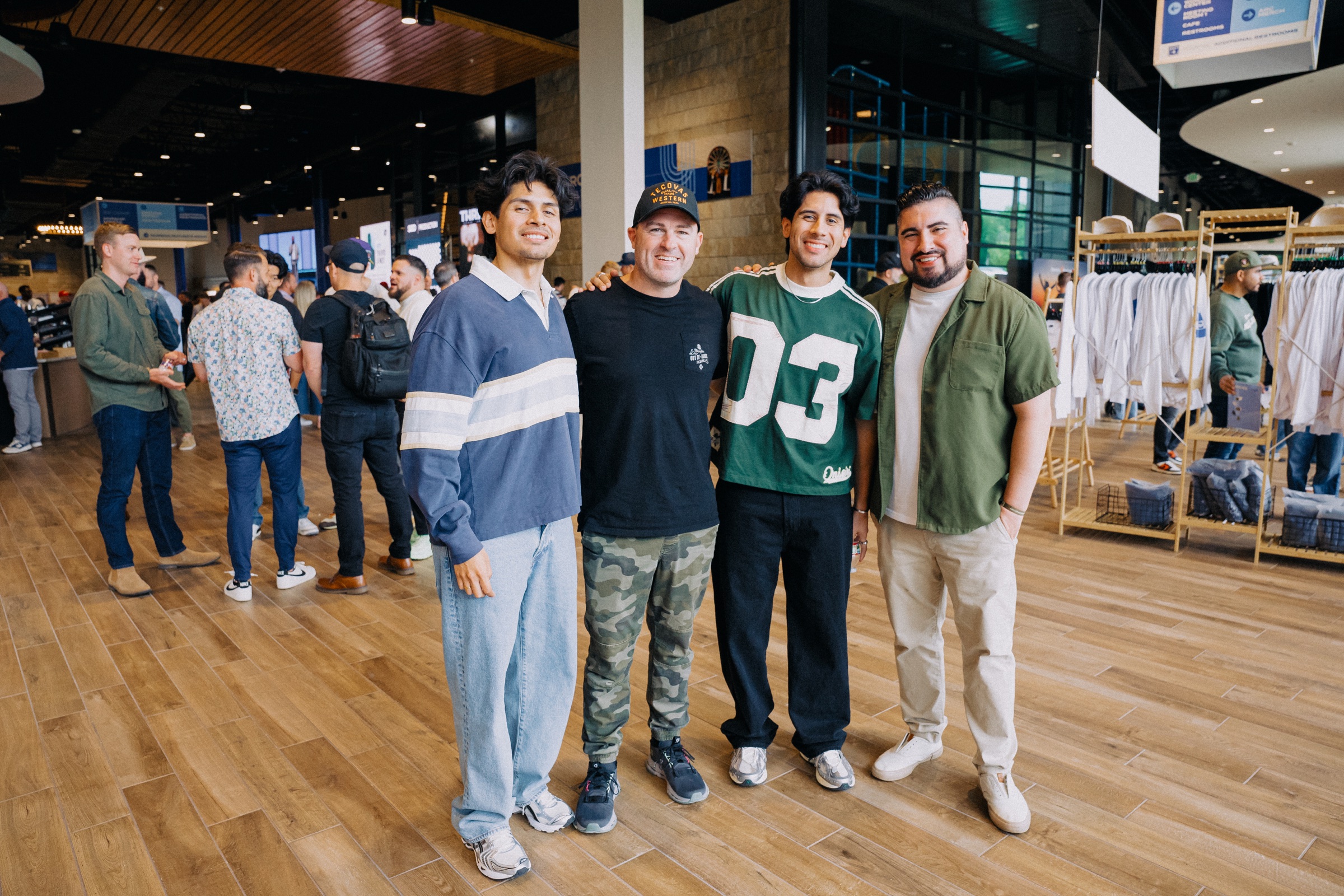 Four youth pastors standing together at a ministry gathering