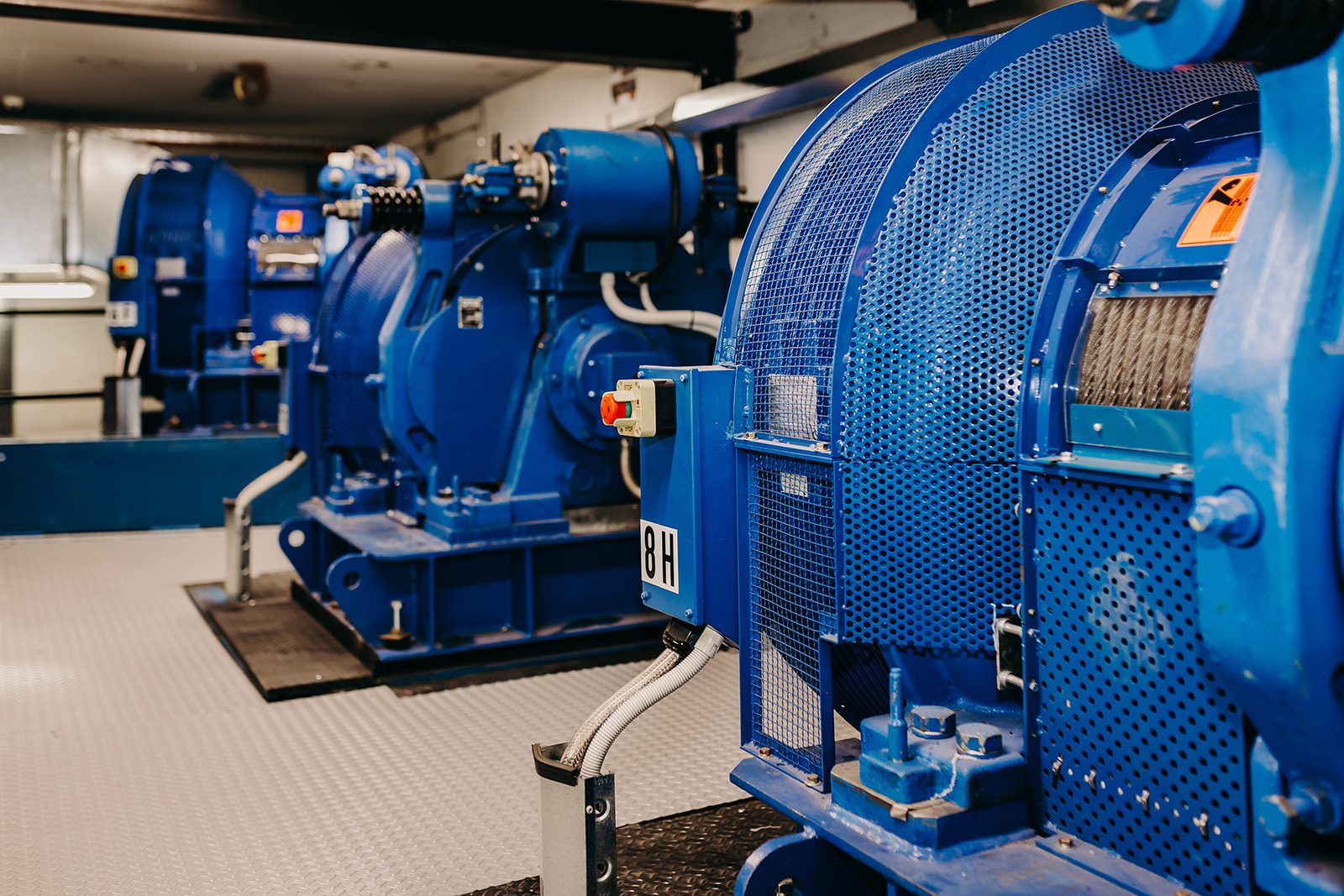 Traction machines in a commercial lift machine room