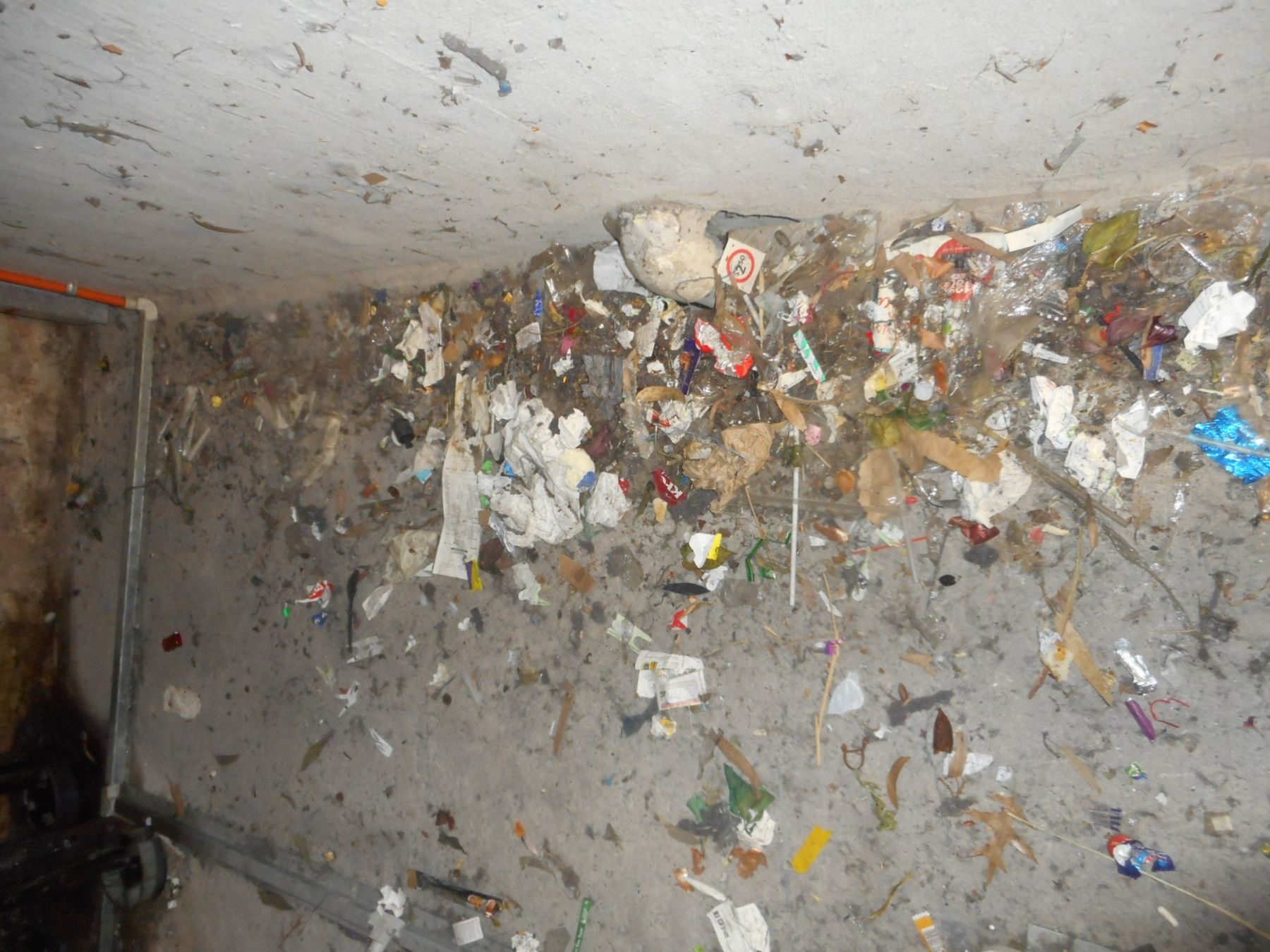 Lift pit with debris and rubbish found during an independent audit