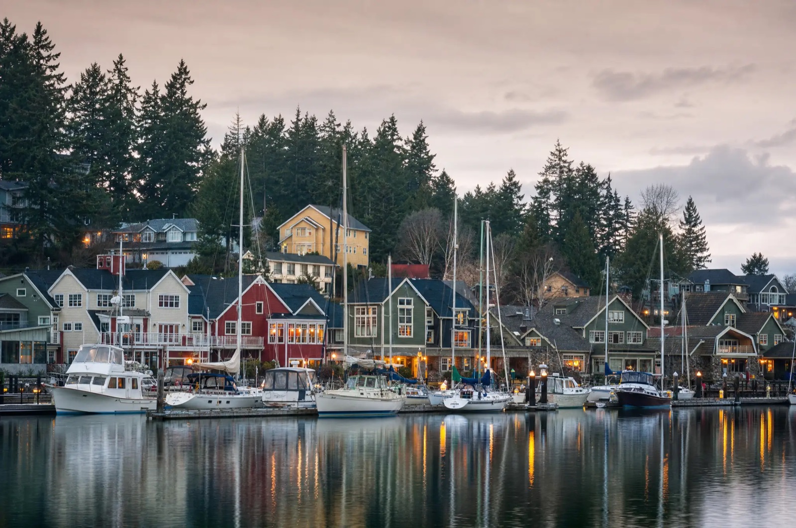 Poulsbo marina on Liberty Bay with the village storefronts behind the docks