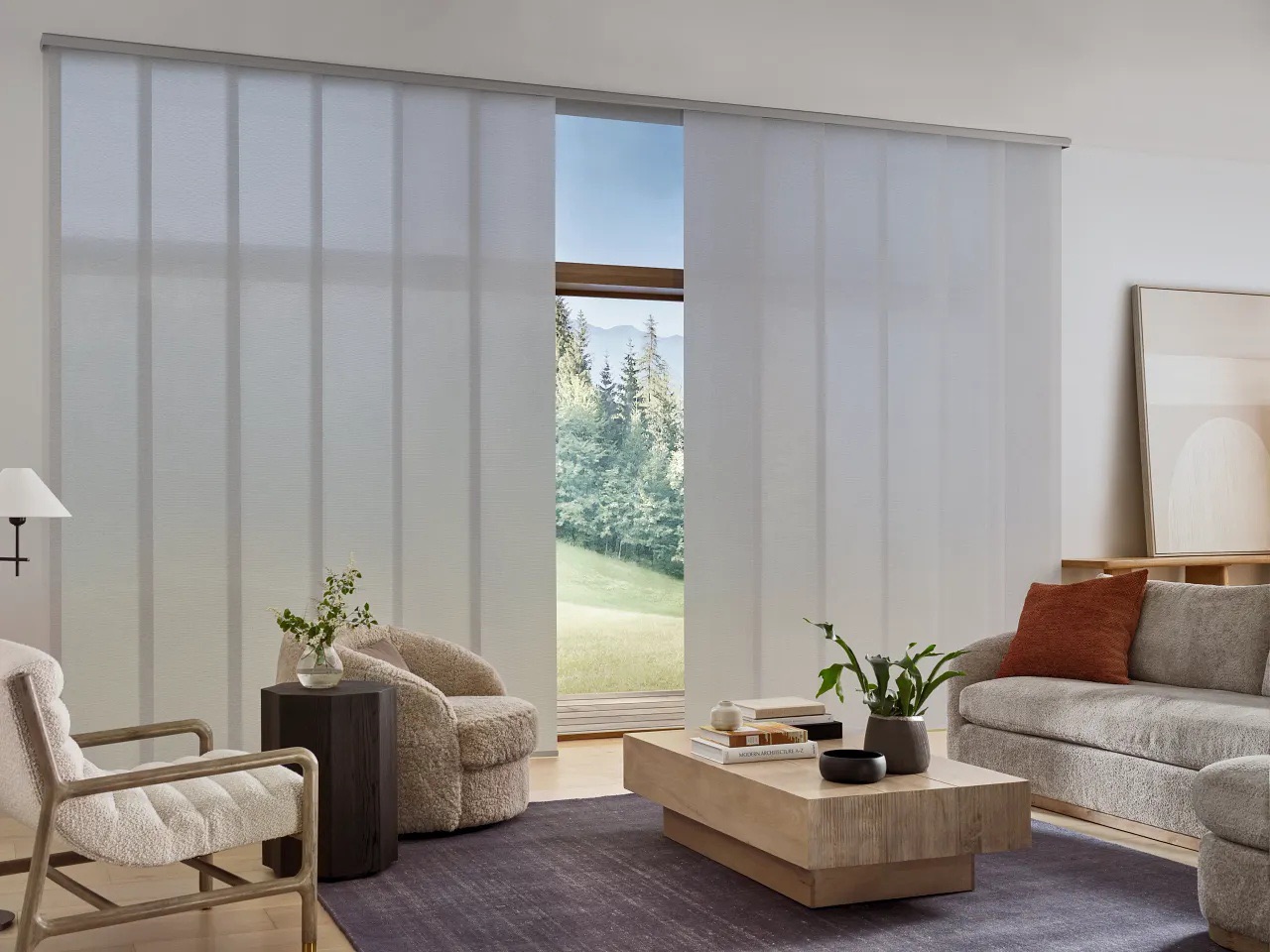 Hunter Douglas Skyline Gliding Window Panels on a living room slider, from Eagle Harbor Window Coverings on Bainbridge Island