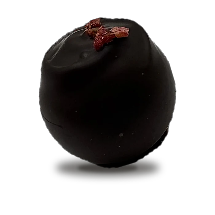 Erdbeer-Trüffel – handgemachte Praline mit Erdbeerstückchen aus dem Torten Atelier Nicole Lachmayr