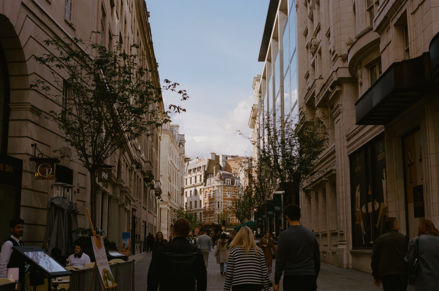 Central London street showcasing classic residential period architecture and luxury homes.